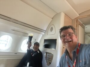Dave Koch directing a crew during jet photoshoot