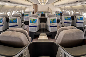 Business class cabin of Airbus A340 photographed by aircraft photographer with custom lighting and digitally enhanced media displays