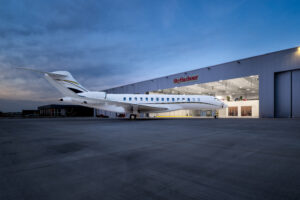 Exterior Aircraft Photography photographed at twilight outside SkyHarbour hangar at Addison Airport (ADS) by professional aircraft photographer