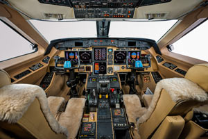 Cockpit of a private jet at Tokyo's Haneda Airport featuring digital avionics and luxury seating