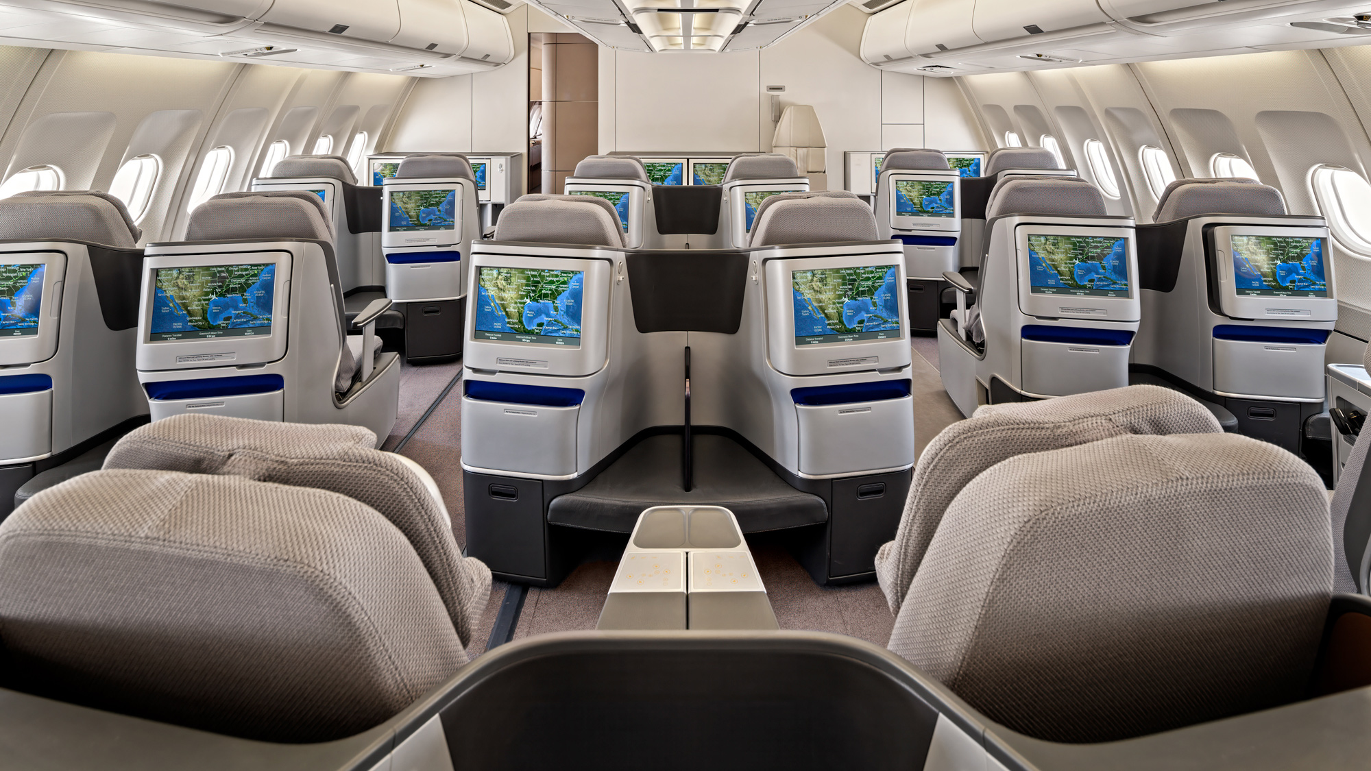 ACJ340 VVIP jet cabin photographed in Dallas, with premium recliner chairs, a large retractable IFE screen