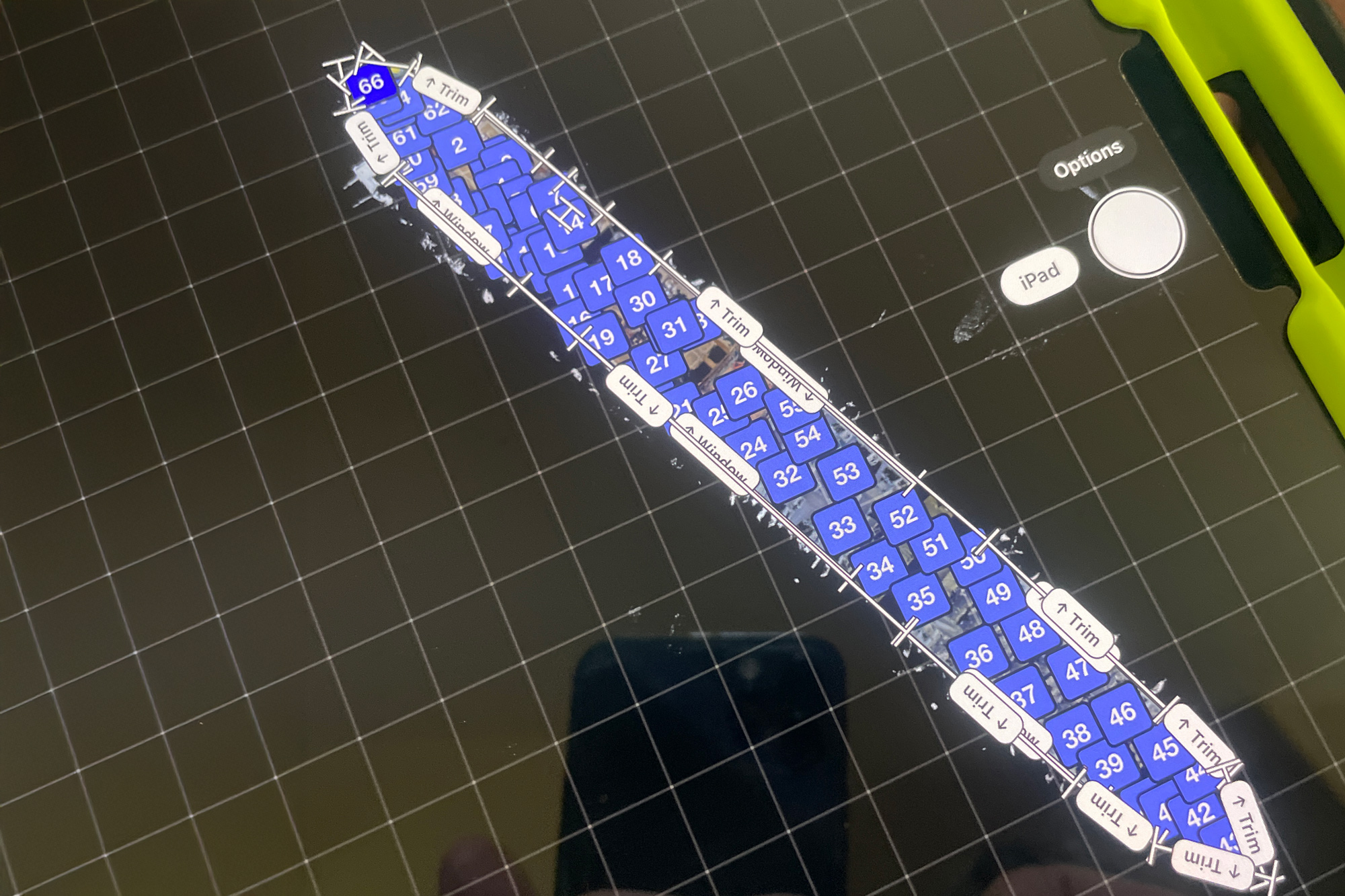 Matterport scan map displayed on iPad during a 3D aircraft virtual tour capture at Van Nuys Airport, showing aircraft interior layout and scan positions.
